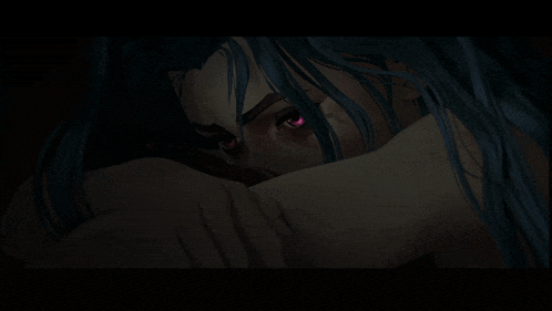 a close up of a woman 's face with blue hair and pink eyes