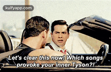 two men are sitting in a car talking to each other and one of them is asking which songs provoke your inner tyson .