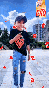 a man wearing a black shirt with a heart on it is standing in front of a building with the word dito on it