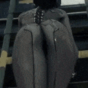 a person is sitting on a set of stairs with their feet crossed .
