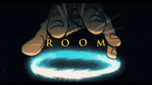 a cartoon drawing of a person holding a circle with the word room written on it
