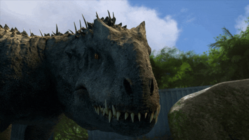 a close up of a dinosaur 's head with sharp teeth