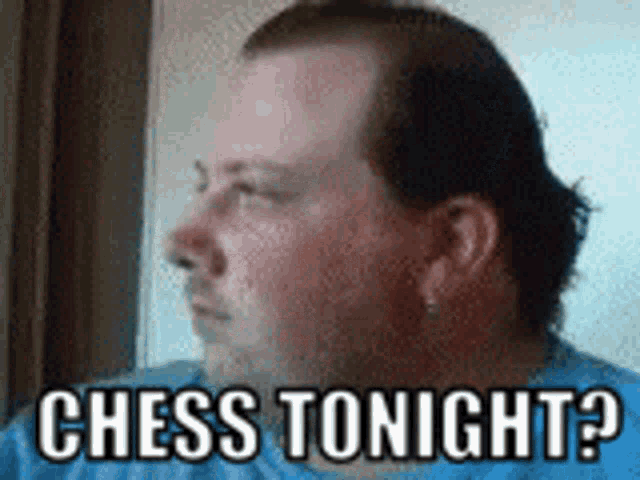 a man is sitting in front of a window with the words `` chess tonight ? '' written on his face .