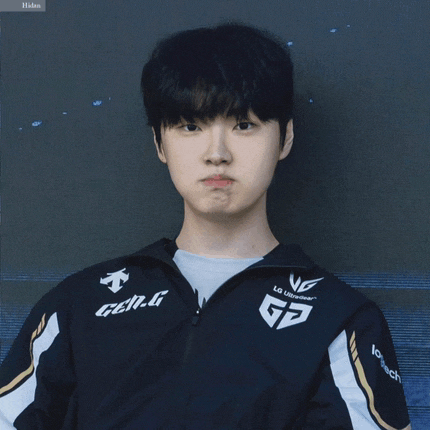 a young man wearing a jacket that says gen.g
