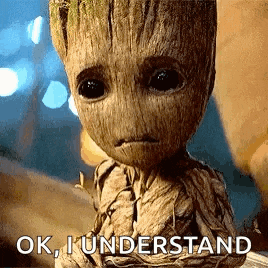 a baby groot from guardians of the galaxy 2 is sitting down and looking at the camera with a sad look on his face .