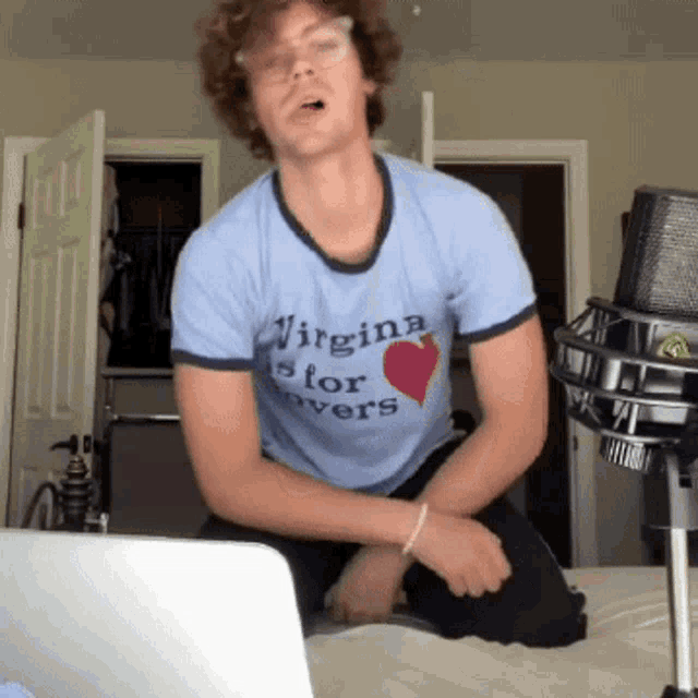 a man wearing a virginia is for lovers shirt