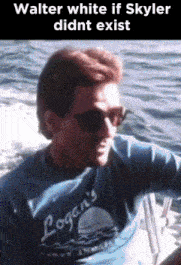 a man wearing sunglasses and a logan 's shirt is sitting on a boat