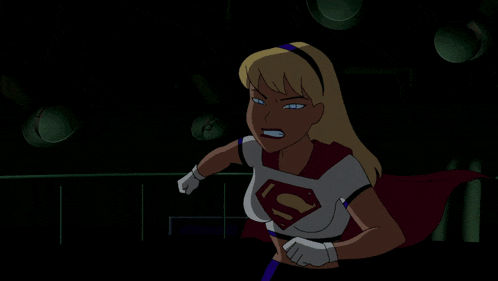 a woman in a superman shirt is being held by another person