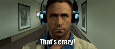a man wearing headphones is walking down a hallway and says `` that 's crazy ! ''