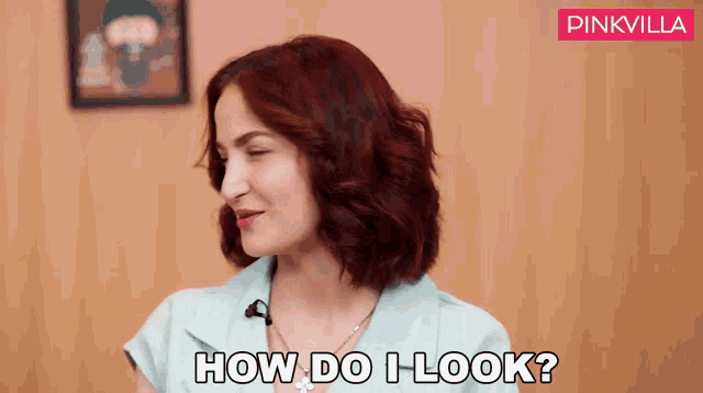 a woman with red hair is asking " how do i look "
