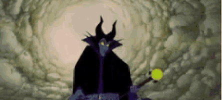 a cartoon character with horns is holding a yellow object .
