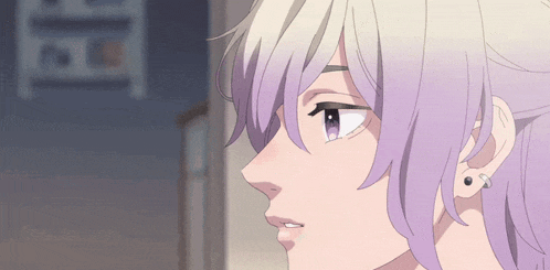 a close up of a girl 's face with purple hair and earrings