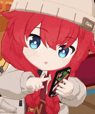 a girl with red hair and blue eyes is holding a card and pointing