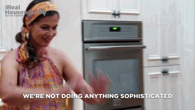 a woman in a kitchen with the words we 're not doing anything sophisticated