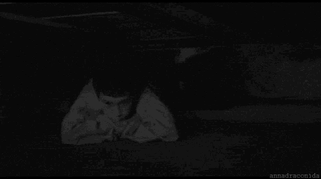 a black and white photo of a scary monster with the name annaraconida written below it
