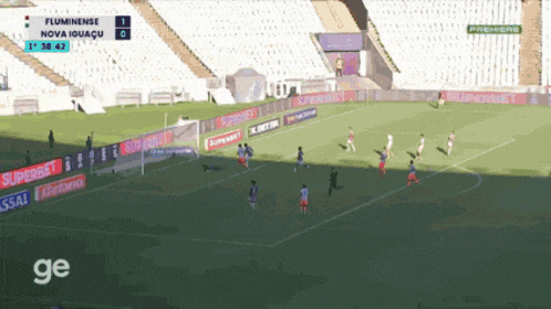 a soccer game is being played between fluminense and nova iguaçu