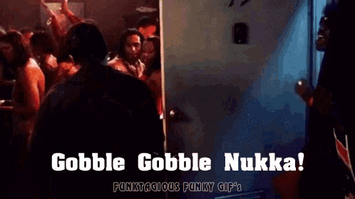 a man standing in a doorway with the words gobble gobble nukka