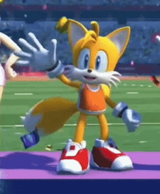 tails from sonic the hedgehog is dancing on a stage
