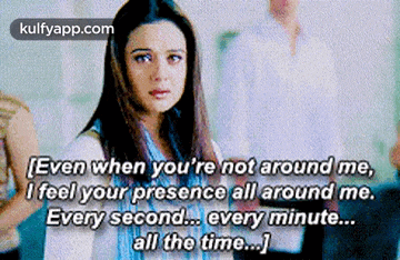 a woman is standing in front of a group of people with a quote that says even when you 're not around me .