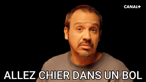 a man says allez chier dans un bol in a dark room