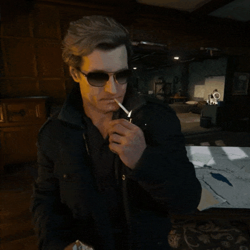 a man wearing sunglasses is smoking a cigarette