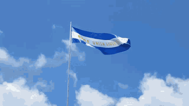 a blue and white flag with the words dios union libertad