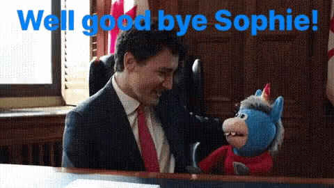 a man in a suit and tie is holding a stuffed animal with the words well good bye sophie written above him