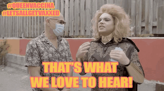 a man wearing a mask talks to a drag queen with the words that 's what we love to hear