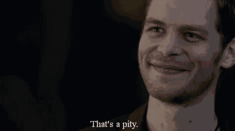 a man is smiling and saying `` that 's a pity '' .