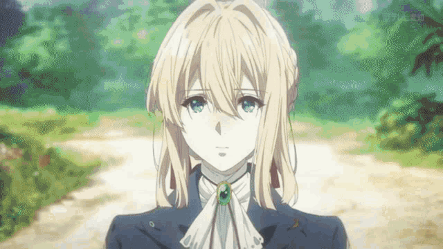 a girl with blonde hair and blue eyes is wearing a blue jacket