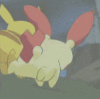a cartoon character with red ears is laying on the ground