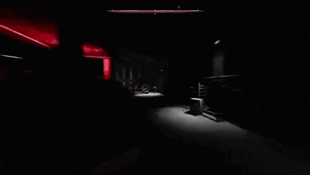 a person is standing in the dark in a video game .