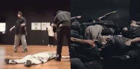 a group of people are laying on the floor and one of them has the word being on the bottom