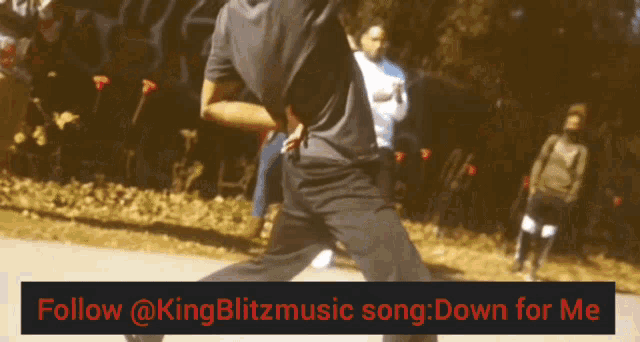 a king blitz music song is being followed by a man