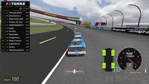a racing game called tgmrs is being played on a computer screen