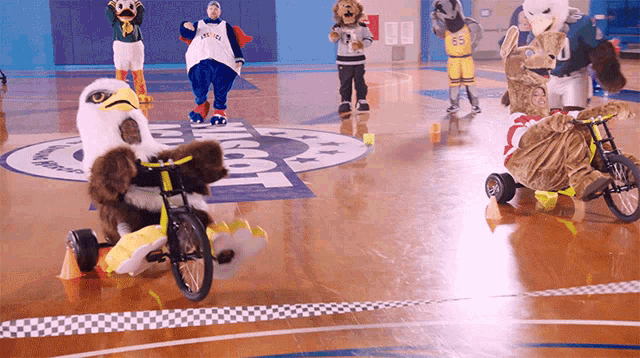 Mascots Bike GIF - Mascots Bike Race GIFs
