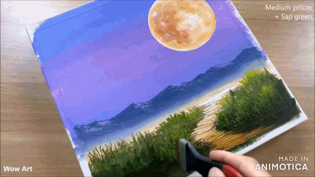 a painting of a full moon is being made in animotoca