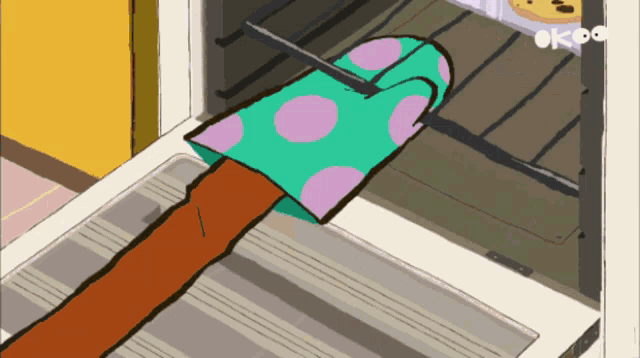 a cartoon drawing of a cookie being cooked in an oven