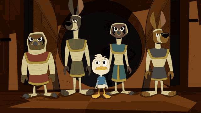a group of cartoon characters standing next to each other including a duck