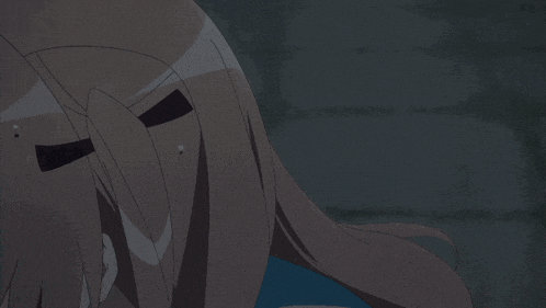 a close up of a person 's face with a few tears coming out of it