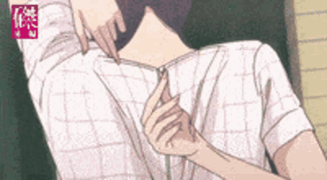a close up of a person 's hand on their chest