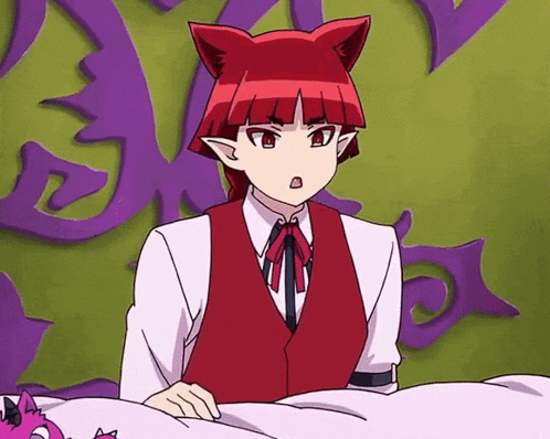 a cartoon character with red hair is sitting on a bed .