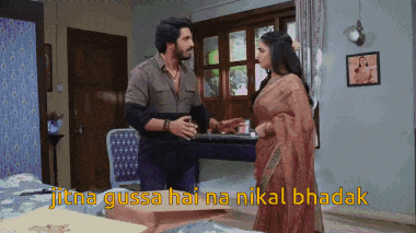 a man and a woman are standing in a room with the words jitna gussa hai na nikal bhadak on the bottom right