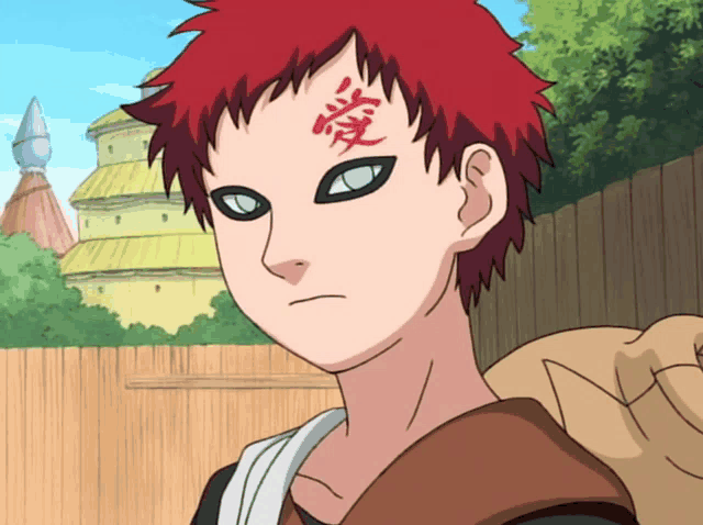 a cartoon character with red hair and chinese writing on his forehead