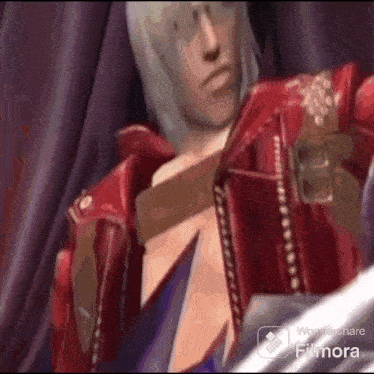 a man in a red jacket is standing in front of a purple curtain .