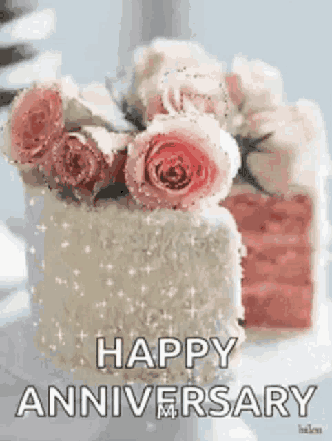 a cake with pink roses on top of it and the words `` happy anniversary ''