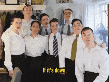 a group of people posing for a picture with the words if it 's down on the bottom