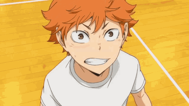 a boy with orange hair and a white shirt is standing on a basketball court with his mouth open
