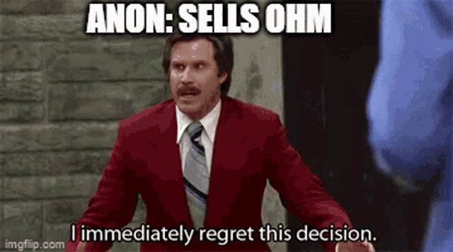 a man in a red suit and tie says i immediately regret this decision