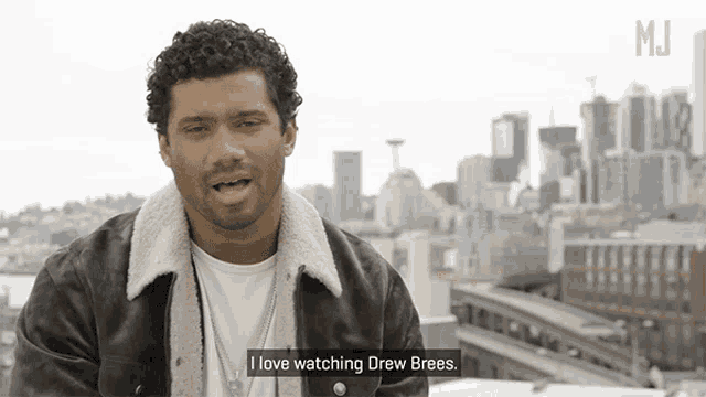 a man says i love watching drew brees in front of a city skyline